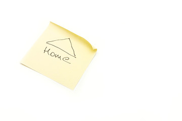 Home letters on a yellow sticker isolated.