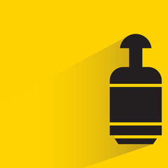beverage bottle with drop shadow in yellow background