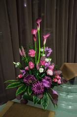 beautiful bouquet on the bar photo beautiful bouquet rose chrysanthemum purple leaves green fluffy flower vase glass calla bar counter bottle background