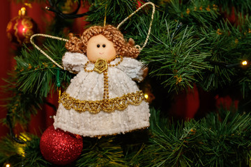 Handmade Christmas tree toy in the shape of an angel