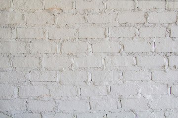 White brick wall texture background. Old masonry painted white.