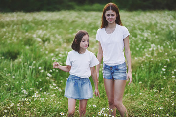 Fototapeta premium mother and daughter in the park
