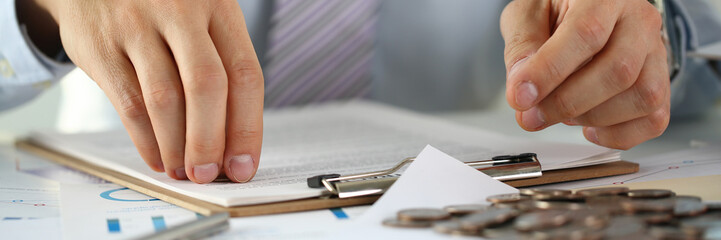 Hand businessman putting pin money