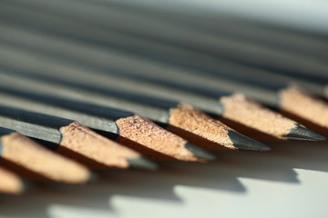 Black pencils many different opinions educational concept