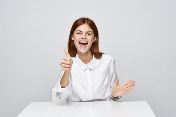 business woman sitting at desk with laptop