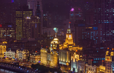 Fototapeta na wymiar Shanghai, China - May 21, 2018: A night view of the colonial embankment skyline in Shanghai, China