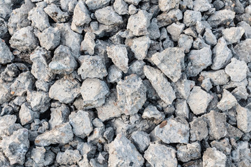 Abstract stone background of a destroyed road.