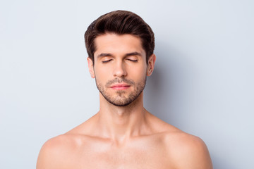 Close-up portrait of his he nice attractive bearded brunette guy after spa laser rf lifting uplift effect soft smooth flawless perfect shine skin isolated on light white gray color pastel background