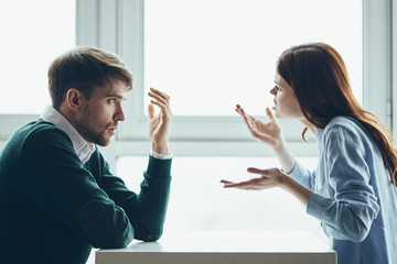 man and woman shaking hands