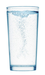 one glass of sparkling water on a white background, isolated object