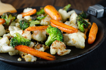 fried vegetables in a pan, vegetarian food, grilled vegetables, fried broccoli cabbage and carrots in a pan