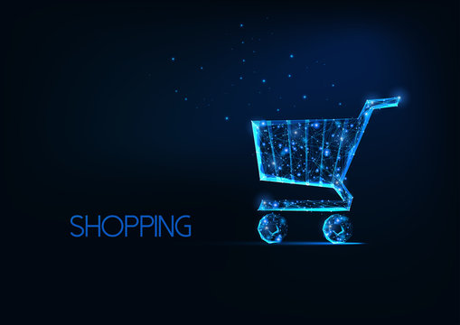Futuristic online shopping concept with glowing low polygonal shopping cart on dark blue background.