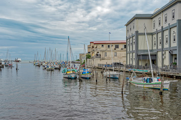 Local sailboats moored in tropical river
