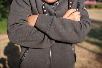 Men's hands are held together because the cold needs warmth.