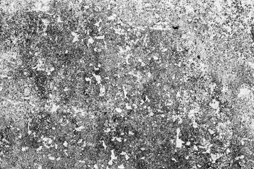 Texture of a concrete wall with cracks and scratches which can be used as a background