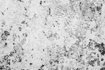 Texture of a concrete wall with cracks and scratches which can be used as a background