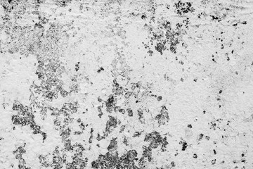 Texture of a concrete wall with cracks and scratches which can be used as a background