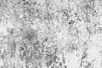 Texture of a concrete wall with cracks and scratches which can be used as a background