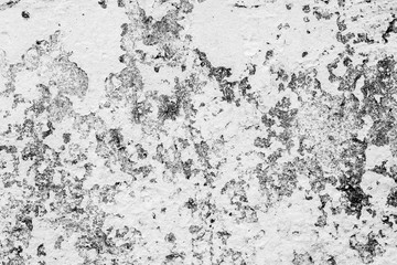 Texture of a concrete wall with cracks and scratches which can be used as a background