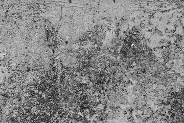 Texture of a concrete wall with cracks and scratches which can be used as a background