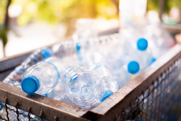 plastic bottle in recycle bin,waste management concept.