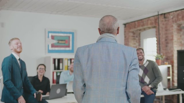 Boss presenting new project to business team