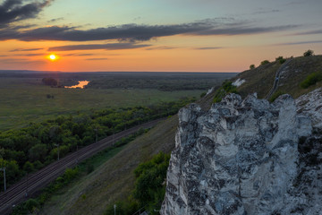 Beautiful sunset above green valley. Divnogorye Museum-Reserve, Voronezh region, Russia