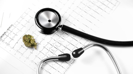 medical marijuana, cannabis bud with cardiolog analytics and stethoscope