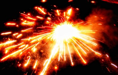 Firecracker scattering light at the night of Diwali