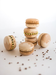 Chocolate cake macaron or macaroon on wooden table