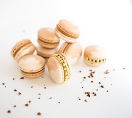 Chocolate cake macaron or macaroon on wooden table