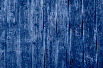 Fototapeta na wymiar Closeup of wooden table in modern in classic blue color.