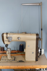 Industrial sewing machine. Handmade concept. Concept of small business to create leather products.