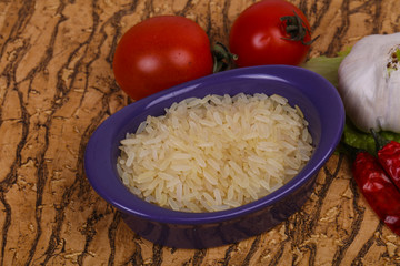 Raw uncooked rice in the bowl