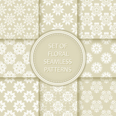 Compilation of floral patterns. White design with flowers on olive green background