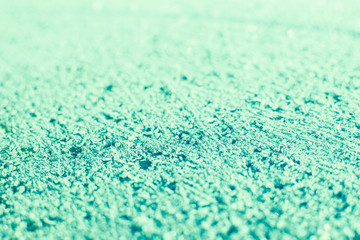 Obraz premium Green snowy surface.