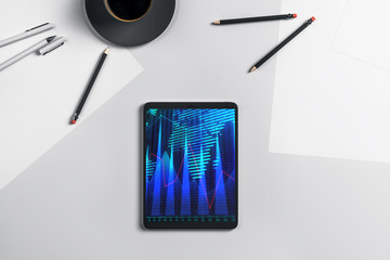 Digital tablet closeup top view with financial graph and partial world map on screen. Online international trading application concept. 3d rendering.