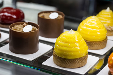 Small dome shaped mousse cake decorated