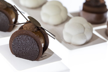 Round mini chocolate cake Dessert on a white background