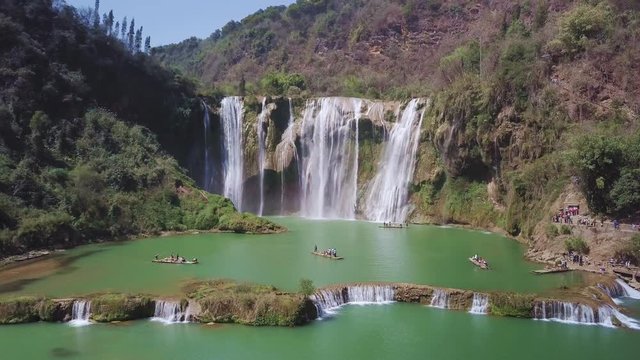 Aerial view drone flight above Jiulong waterfall in Luoping, Yunnan, China