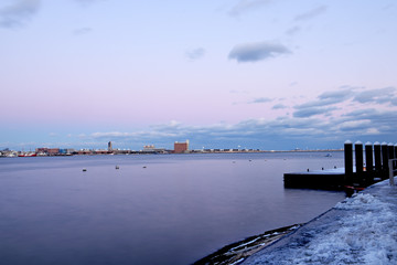 Fototapeta na wymiar Winter view of the Boston Bay. Old pier. USA. Massachusetts.