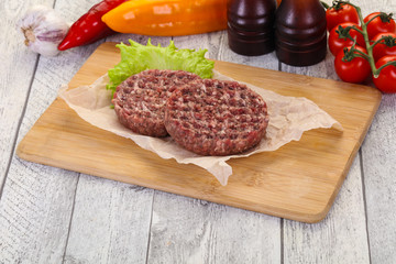 Raw burger cutlet