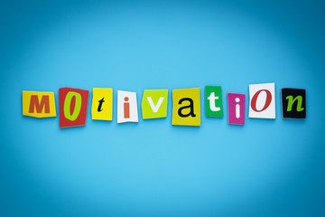 Motivation - word on a blue background made of colorful letters. Bright banner with the inscription, text. The psychological concept.