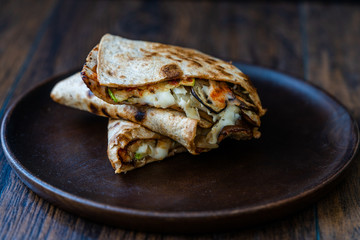 Veggie Italian Closed Calzone Pizza Slices with Mushrooms.