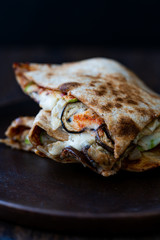 Veggie Italian Closed Calzone Pizza Slices with Mushrooms.