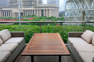The table and sofa are in the hotel.