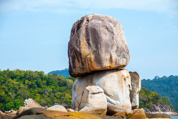The rocks are located by the sea at dawn     