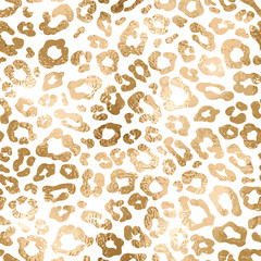 Fashion seamless pattern with gold leopard fur. Metallic animal skin on white background