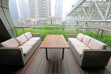 The table and sofa are in the hotel.