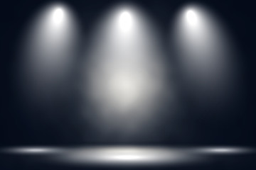 White stage with spot lighting and fog in black background. 
